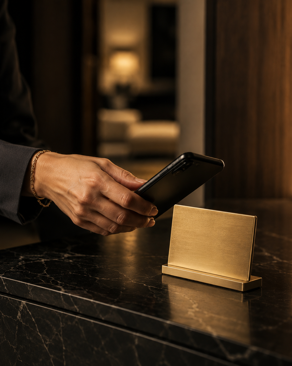 Concept rendering of a guest bringing a phone to a Private Client touchpoint as the advisor notification is triggered